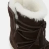 Evx Stiefel aus dunkelbraunem Wildleder und Lammfell Evx Stiefel aus dunkelbraunem Wildleder und Lammfell